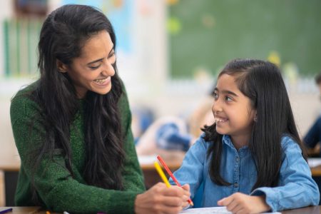 Teacher Teaching Kids Happily